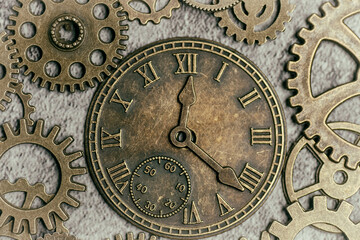 Steampunk style clock surrounded with gears and cogs