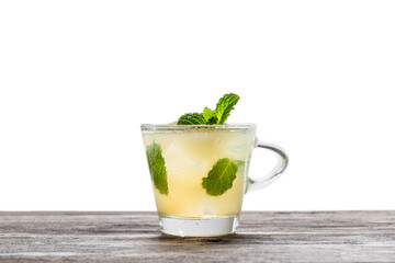 Green tea with ice in glass cup isolated on white