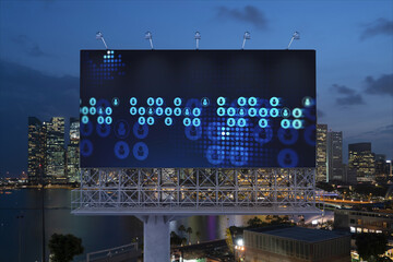 Glowing Social media icons on billboard over night panoramic city view of Singapore. The concept of networking and establishing new connections between people and businesses in Southeast Asia