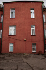 the windows in the old building are red