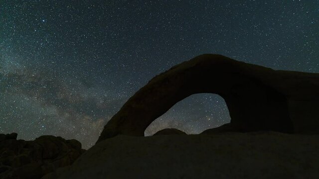 Time lapse tracking shot of Milky Way galaxy rising over Scorpius Arch in California