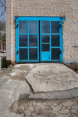 old blue mechanical garage doors