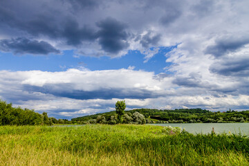 Fototapeta na wymiar Series of beautiful views on Rauchwart lake in a suny day, Burgenland, Austria.