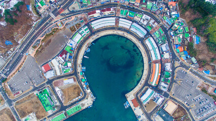 Sokcho, South Korea, 2016 - Sokcho Fish Town. View from above. Round bay of the sea city of Sokcho. Fish breaks are around the sea area.