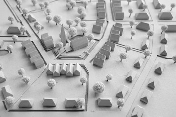 Städtebauliches Modell eines Dorfs oder einer Stadt mit Zentrum, Kirche und Wohngebäuden
