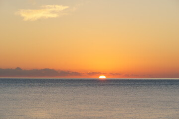 Sunrise over the calm sea