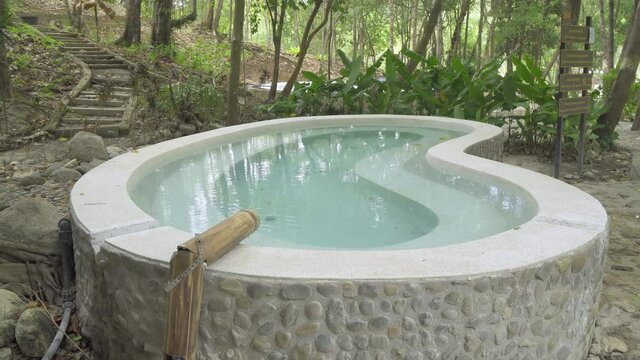 Famous natural hot spring well at Porn Rang Hot Spring, Ranong, Thailand.