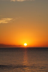 Sunrise over the calm sea