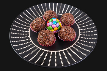 brigadiers in black dish on black background