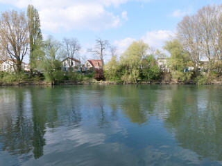 Fototapeta na wymiar The Marne river at Saint-Maur-des-Fossés in the east of Paris. April 2021, France.