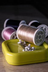 sewing thread and fabric pins