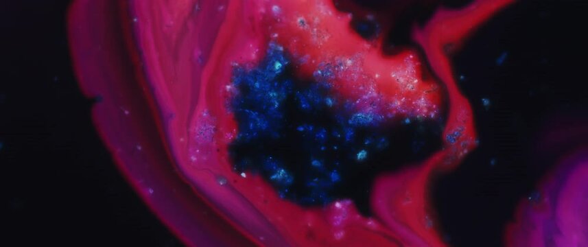 Macro Textures with Vibrant Neon Color Palette. Abstract Background Made with Oil Mixed with Royal Blue and Pink Dye, Ink, and Paint.