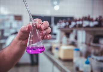 Laboratory test beaker with colored liquids