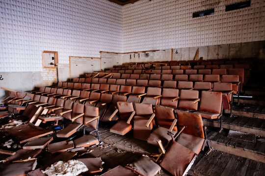 Old auditorium of abandoned stage or cinema theater