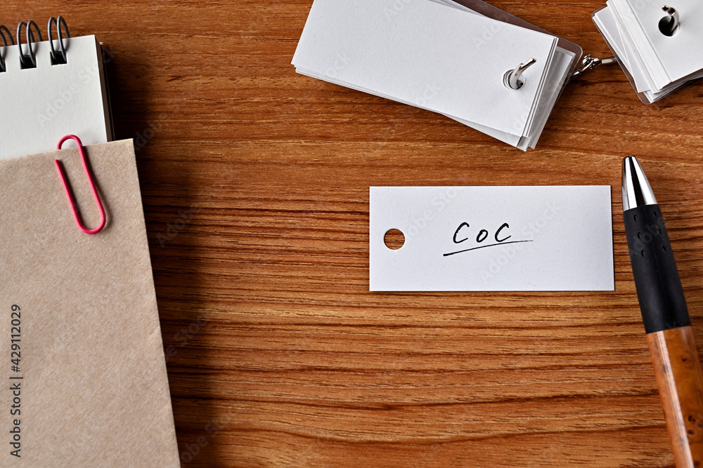 Poster there is a word book with the word coc written on it. it is an abbreviation for financial term chang