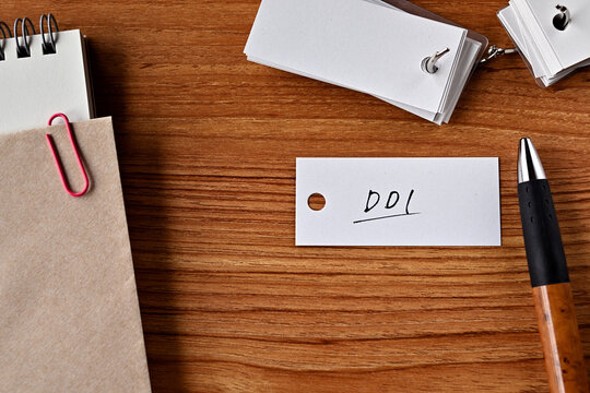 There is a word book with the word DDI written on it. It is an abbreviation for financial term domestic disposable income.