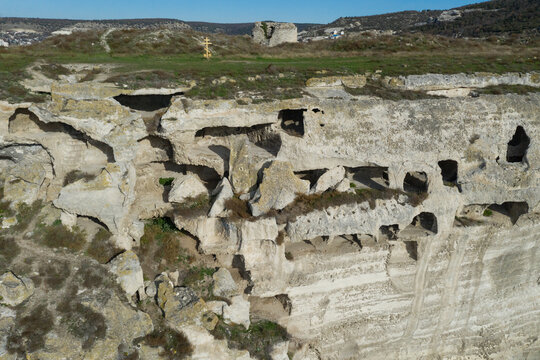 Cave complex at the fortress of Kalamita in Inkerman. Caves in the mountains near the monastery. Old Crimean caves.