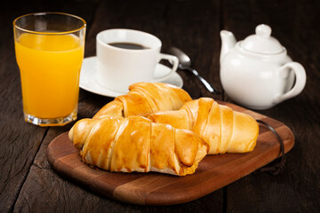 Traditional fresh baked croissants on the table.