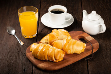 Traditional fresh baked croissants on the table.