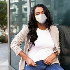Businesswoman wearing mask during COVID-19 in the new normal