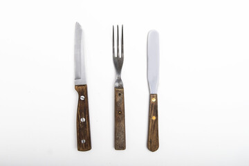 old cutlery on white background