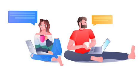 people chatting in computer app on laptops chat bubble communication concept