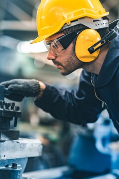 Industrial Engineers In Hard Hats.Work At The Heavy Industry Manufacturing Factory.industrial Worker Indoors In Factory. Man Working In An Industrial Factory.Safety First Concept.