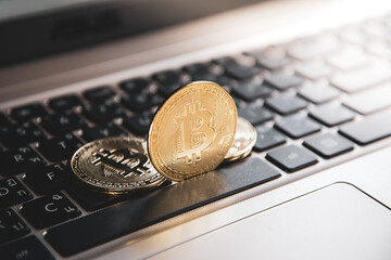 gold bitcoin  on laptop computer, digital currency money trading with cryptocurrency, Block Chain and finance concept.