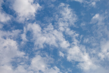 Soft white clouds texture on beautiful afternoon sky background. Image for background design The clear sky makes you feel fresh and clear.