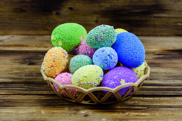 Easter eggs made of styrofoam on a wooden background