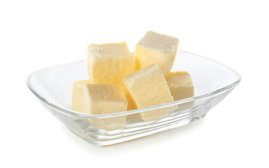 Glass bowl with fresh butter on white background