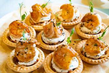 canapes with shrimp. A convenient buffet feed. little sandwiches at the festival. Catering. delivery of ready meals and service of banquets.