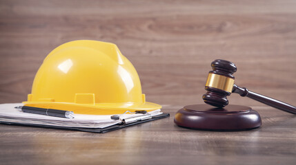 Judge gavel and safety helmet. Construction Law