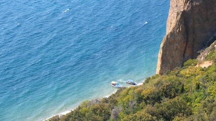 Beautiful view of the coast of the turquoise sea at Cape Fiolent, Crimea. The concept of tranquility, silence and unity with nature