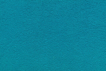 Cyan plaster facade texture background. External facade of the building, plaster with clear texture.