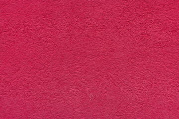 Red plaster facade texture background. External facade of the building, plaster with clear texture.