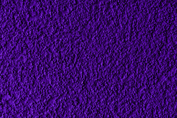 Purple plaster facade texture background. External facade of the building, plaster with clear texture.