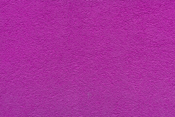 Purple plaster facade texture background. External facade of the building, plaster with clear texture.