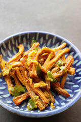 Dry Bombay duck fried with chili and garlic. Dried Bombay duck masala. also known as suke bombil masala in Marathi. Dried bombil chutney. Dehydrated bombil fish. Copy space.