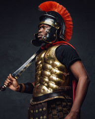 Roman warrior holding gladius on his shoulder