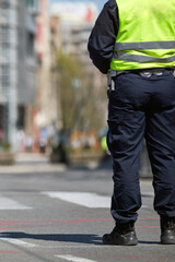 Police officer on the street in urban envirnoment.