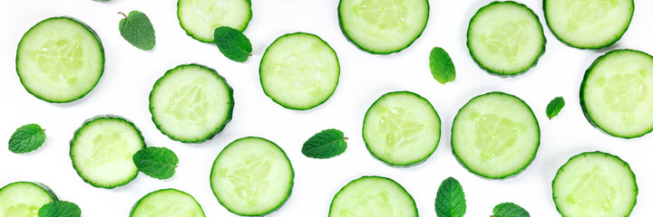 Fresh summer food and drink panorama with cucumber slices and mint