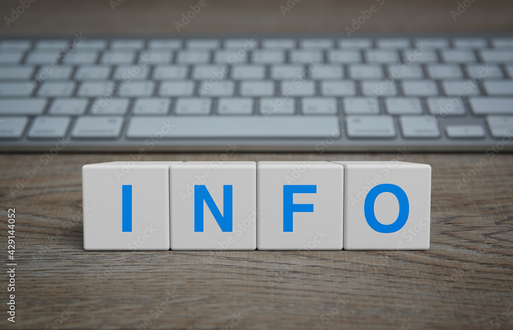 Poster info letter on white block cubes on wooden table with modern computer keyboard, business customer se