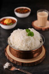 Noolappam/Idiyappam/rice noodles, a popular traditional steam cooked Kerala breakfast dish with hot and spicy egg roast curry on a houseboat, Alleppey, India. South Indian food. noolputtu Sri lankan