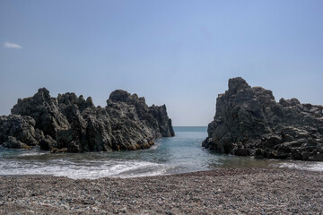 Tough rocks island on the sea