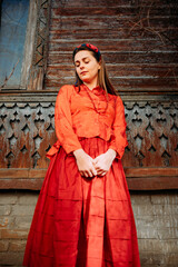 portrait of a woman in red dress