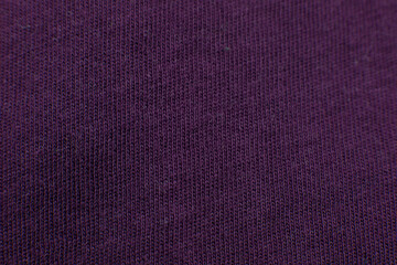 Purple cloth texture background. Material for clothes.