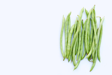 Green beans on white background. Copy space