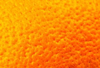 Close up photo of orange peel texture. Oranges ripe fruit background, macro view. .Human skin...