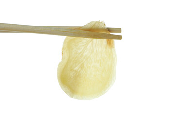Chopsticks with pickled ginger isolated on white background